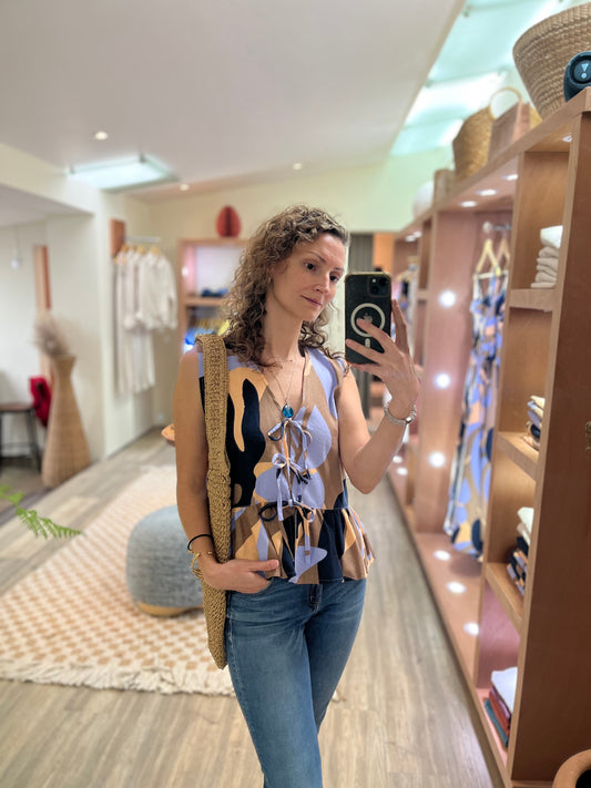 Chaleco tiras estampado morado